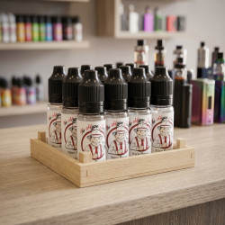 Lot de boosters Nico Boost The Hype Juices rangés dans une caisse en bois