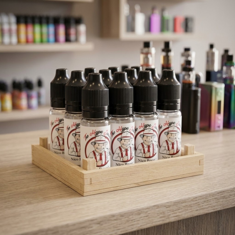Lot de boosters Nico Boost The Hype Juices rangés dans une caisse en bois