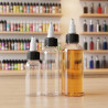 Flacons Twist 30, 60 et 120 ml sur un plan de travail DIY